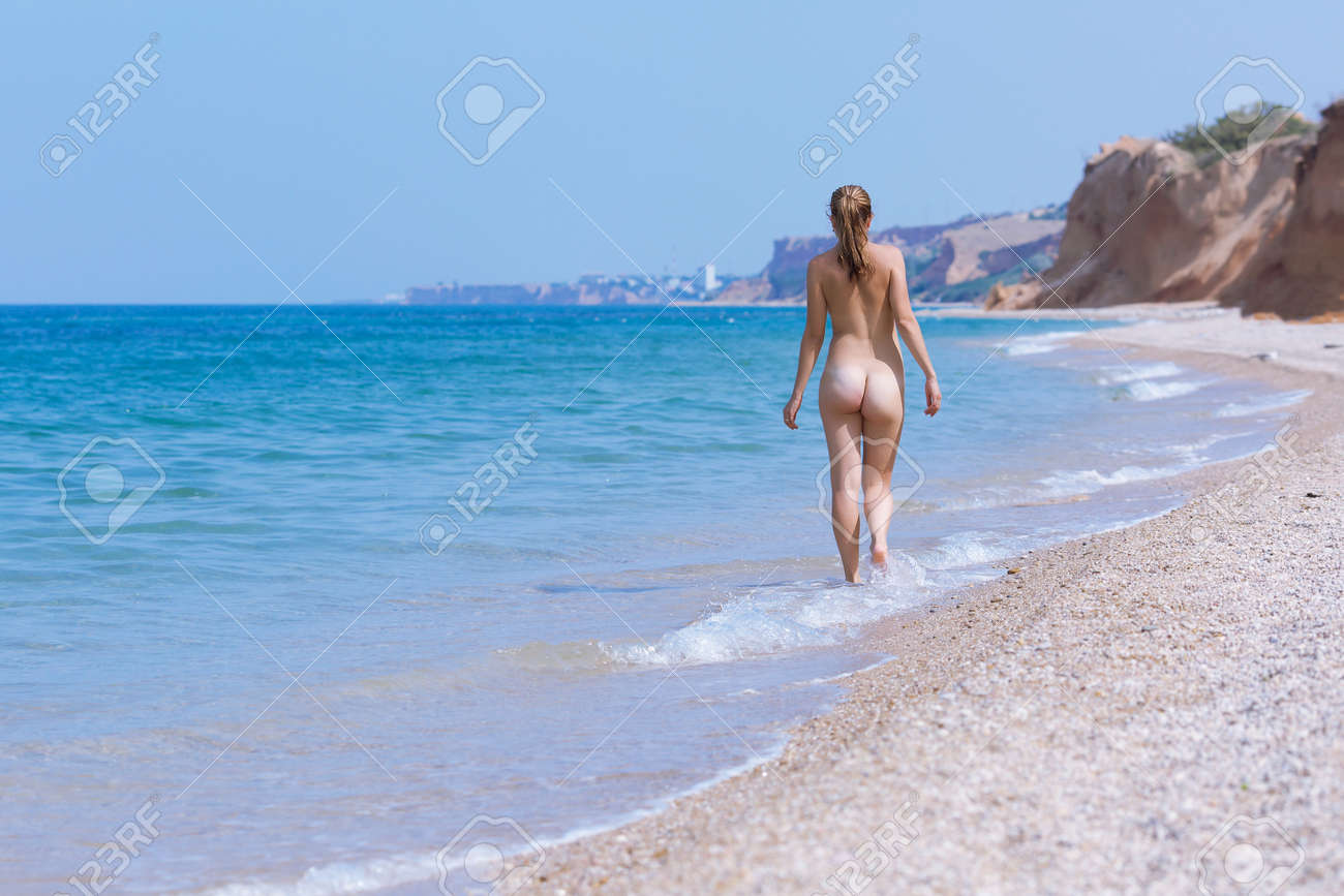 catherine caines add nude beach strolling image