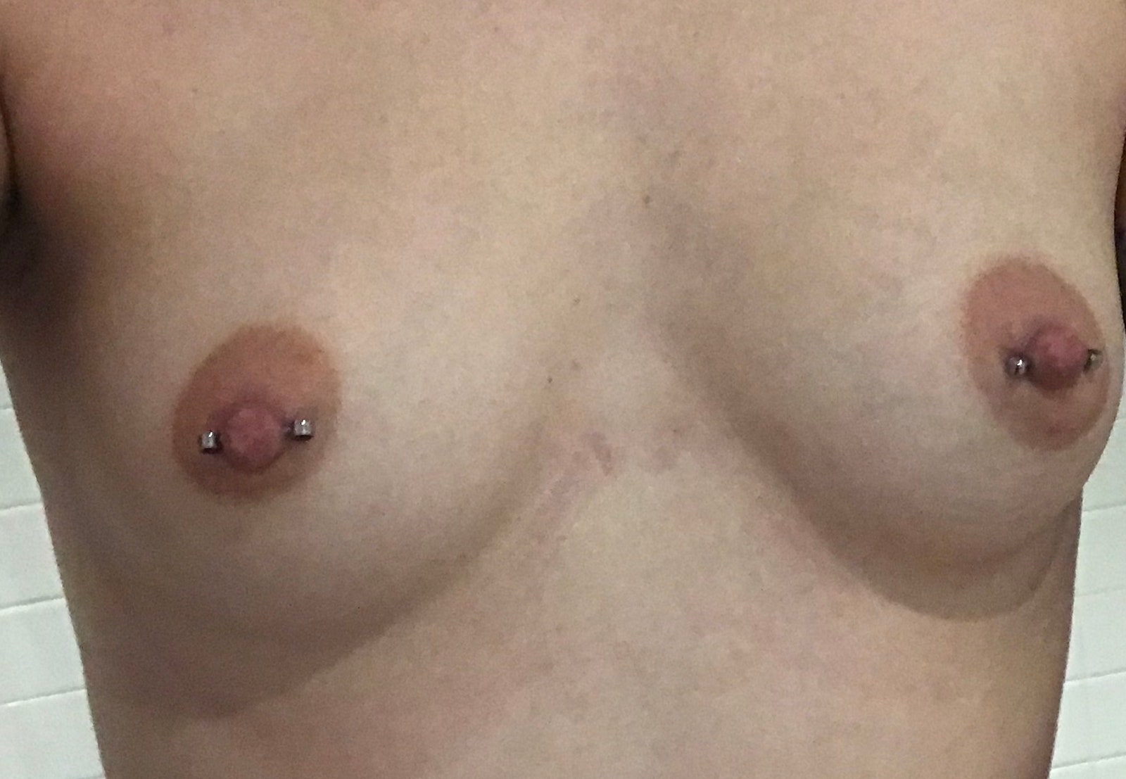 carson mahoney add asian pierced nipples photo